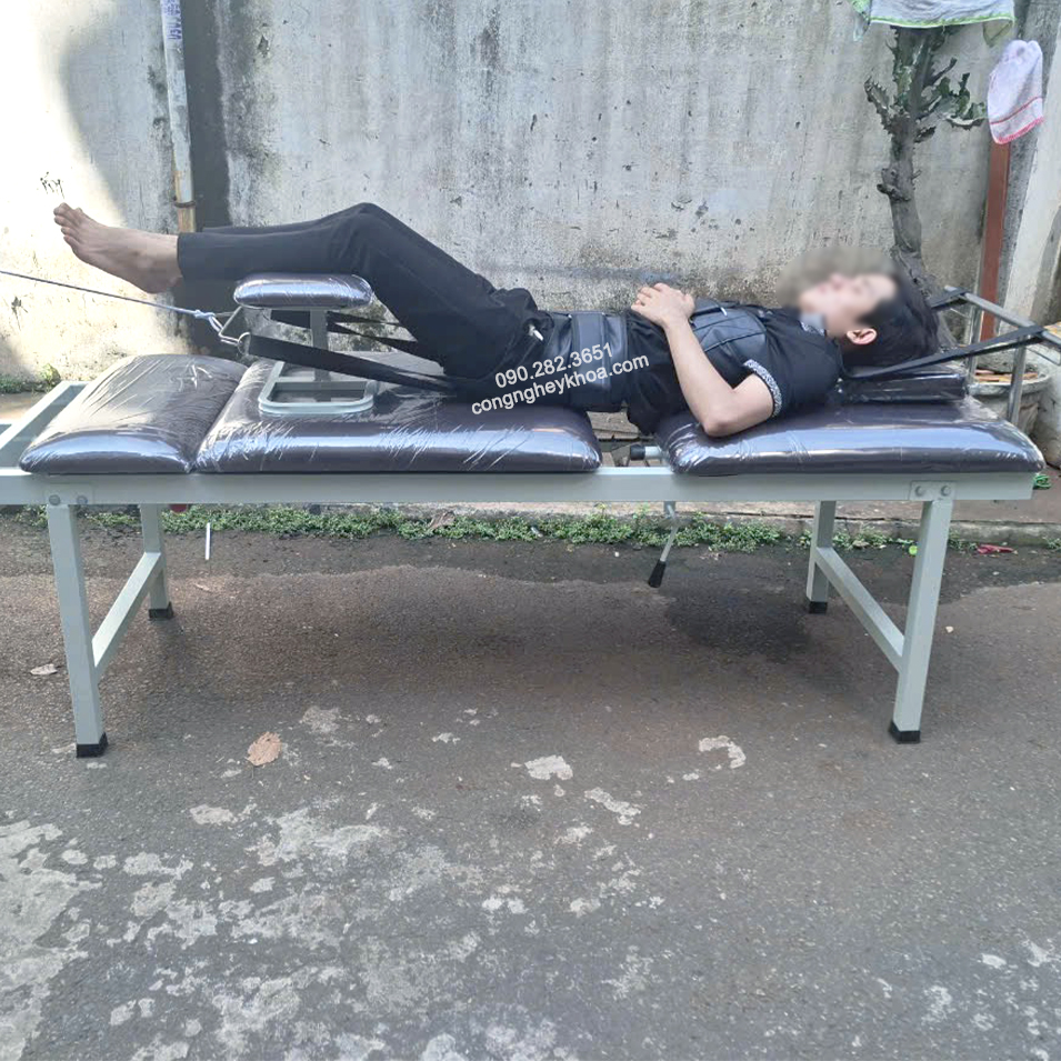 Máy vật lý trị liệu phục hồi chức năng cho từng bệnh lý 7 Hình ảnh thực tế của giường kéo giãn cột sống bằng tạ