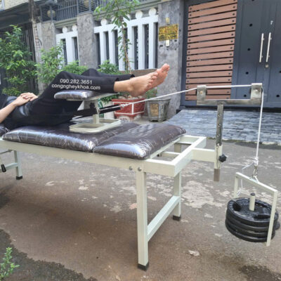 Giường kéo giãn cột sống bằng tạ